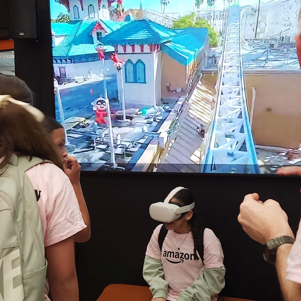 girl wears vr headset at amazon girls in tech day at whyndham tech school