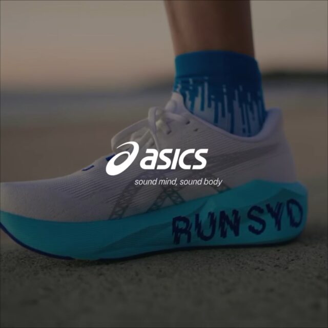 ASICS running shoe in white and turquoise with “RUN SYD” written on the sole, overlaid with the ASICS logo and the text “sound mind, sound body.”